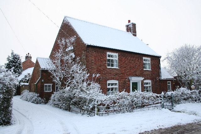 A cottage in snow